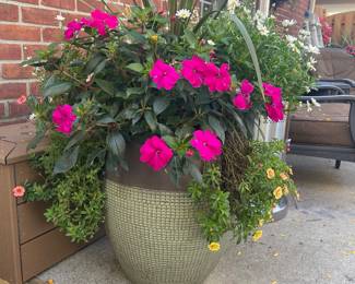 4 Ceramic Planters with Flowers $45 each