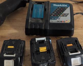 Makita DCRC Battery Charger and Three Batteries