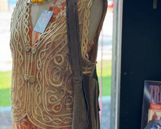 90s silk vest, 70s suede bag, and collectibles.
