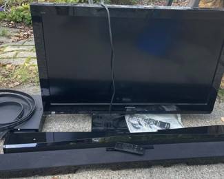 Panasonic TV, Vizio Soundbar Model SB4020E-AO, and Sony PS3 Console with Accessories