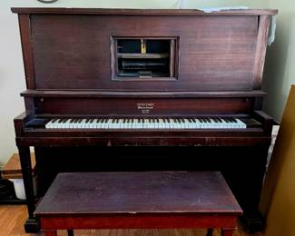Piano w/ bench and piano rolls