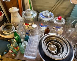 Vintage stoneware, bottles, and glass canisters