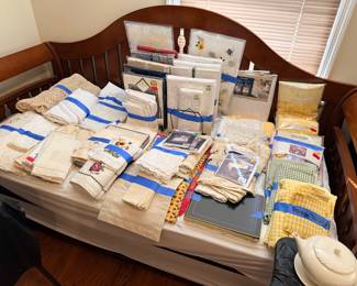 Cherry daybed and vintage table linens
