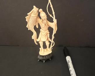 Vintage Resin Fisherman Figurine with Carp