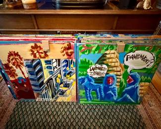 Huge collection of Steve Keene album cover paintings on large pieces of plywood; signed