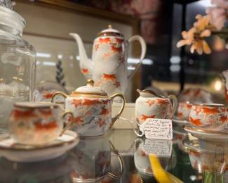 Vintage Egg Shell Porcilain Autumn Tea Set from Japan. Has faces in the bottom of cups