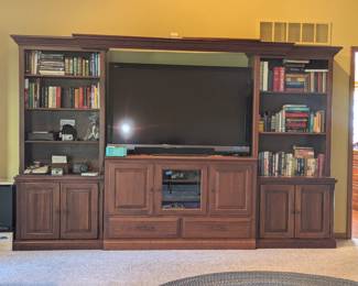 Sold wood Amish made Entertainment Center $2000