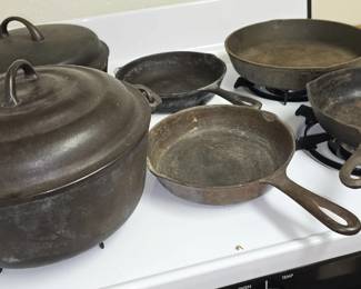 COLLECTION OF VINTAGE CAST IRON PANS