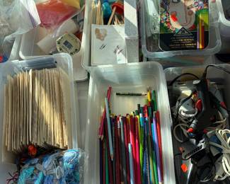 Pencils and hot glue guns. Crafting supplies