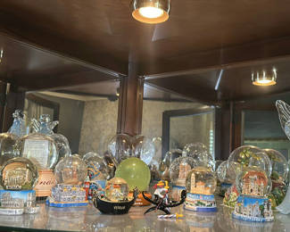 Lot 87: Collection of Travel Souvenir Snow Globes and Glass Angel Figurines
