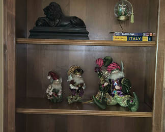 Lot 108: Decorative Figurines, Travel Books, and Glass Decor