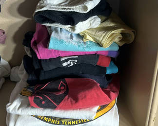 Lot 260: Y2K- Stack of Folded T-Shirts and Workout Wear 