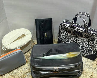 Lot 209: Assorted Cosmetic and Travel Bags with Fragrance Bottle