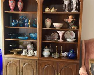 2 bookcases and glassware