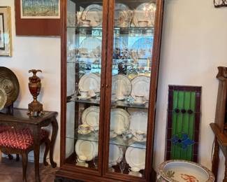 WOOD WITH IRON MIRROR BACK LIGHTED CURIO CABINET