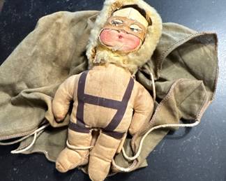 Vintage WWII-era cloth paratrooper parachute doll, circa 1940s, likely Raggy-Doodle type. Original parachute and cords present. 