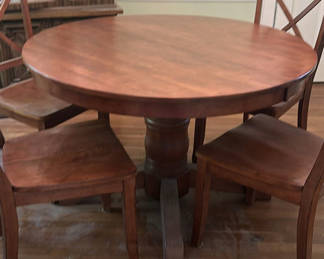Lot 16: Round Wooden Pedestal Dining Table and Matching Chairs