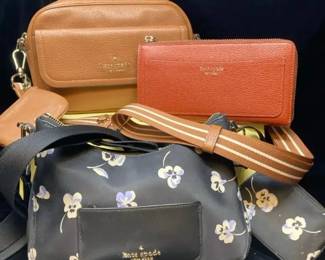 Two Kate Spade bags and one Kate Spade wallet
