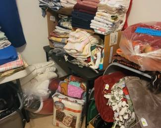 Several blankets some new and some used towels, 
