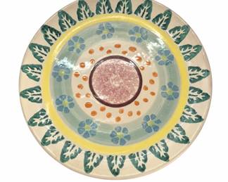 Handpainted ceramic dish on white