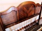 Full Size Contemporary Style Headboard with nicely curved / scalloped wood top, and cane accents