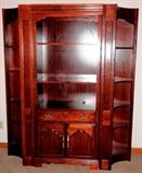American Drew Cherry 3 Pc. Lighted Wall Unit with beautiful cherry finish, glass & wood shelves, and double door cabinet storage.  Use together or separate the two end pieces and use as corner units
