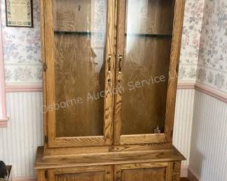 Oak gun cabinet with keys