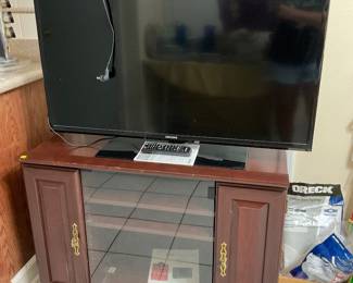 Tv and cabinet