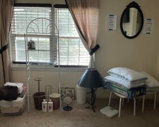 Pillows bathroom items and lamps 