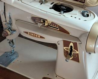 Singer model 503A sewing machine in wooden cabinet