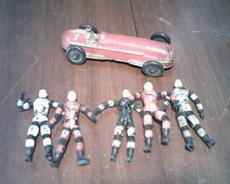 Various toys. Major Matt Mason and 1930's racer shown.