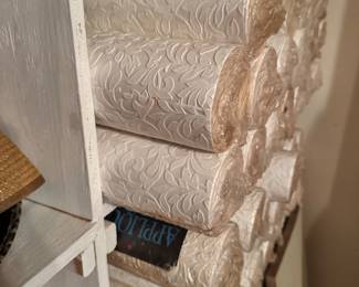Rolls of embossed paintable wallpaper