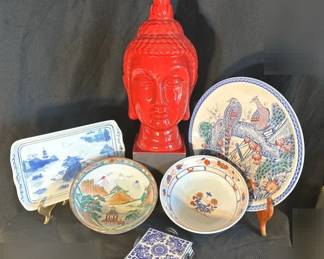 Red Buddha Head Ceramic Sculpture with AsianInspired Bowls and Plates