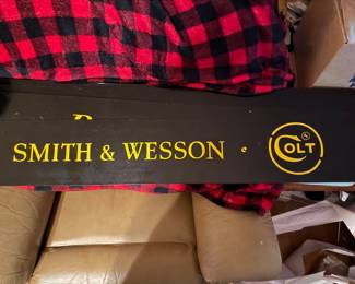 Smith & Wesson/ Colt 1960’s signage from a sporting goods store.