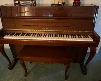 Open pic of piano w/ bench