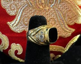 Onynx gold and diamond ring