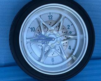 Lot #60 - 14-Inch Tire Rim Wall Clock