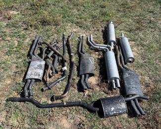 Lot #33 - Assorted Automotive Mufflers, Exhaust Pipes & Resonators