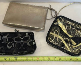 Lot 341: Coach Wristlet and Two Clutch Handbags