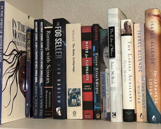 Lot 131: Assorted Fiction and Nonfiction Books with Decorative Ivy Plant
