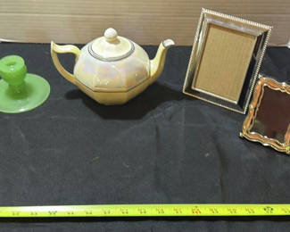 Lot 305: Green Glass Candlesticks, Iridescent Teapot, and Picture Frames