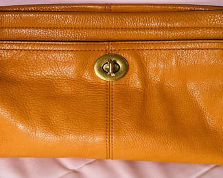Lot 48: Coach Orange Leather Wristlet Clutch Bag