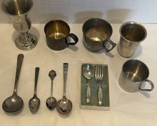 Lot 337: Assorted Silver-Tone Cups, Goblet, Spoons, and Serving Utensils