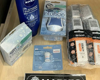 Lot 42: Nivea Body Lotion, Schick Intuition Razors, Reach Dentotape, Marvis Toothpaste, and Walgreens Dental Repair
