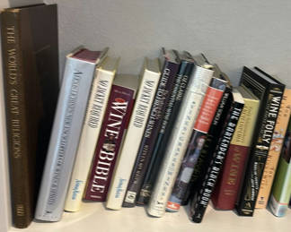 Lot 134: Collection of Wine and Beverage Books with Assorted Music CDs
