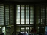 Custom wood shutters throughout.