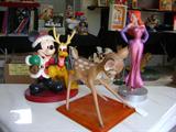 BEAUTIFUL LARGE SPLIT FAUX MARBLE COFFEE TABLE. GREAT FOR ENTERTAINING. LOTS OF LARGE COLLECTIBLE DISNEY FIGURES.