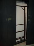 CUSTOM BUILT MURPHY BED WITH SIDE CORNER SHELF.