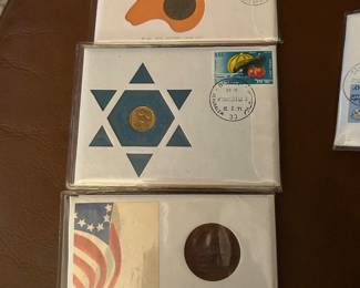 Cards with coin and stamp