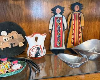 Southwest decor including Nambe bowls and leather dolls by Julie Hopkins